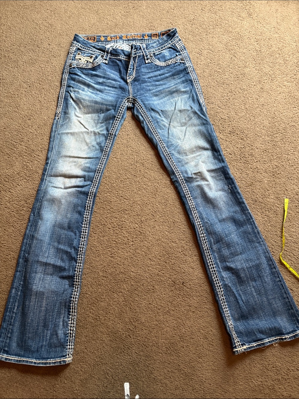 Rock Revival Women's Distressed Blue Flare Jeans with Contrast Stitching